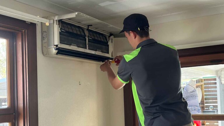 an electrician fixing air-conditioning